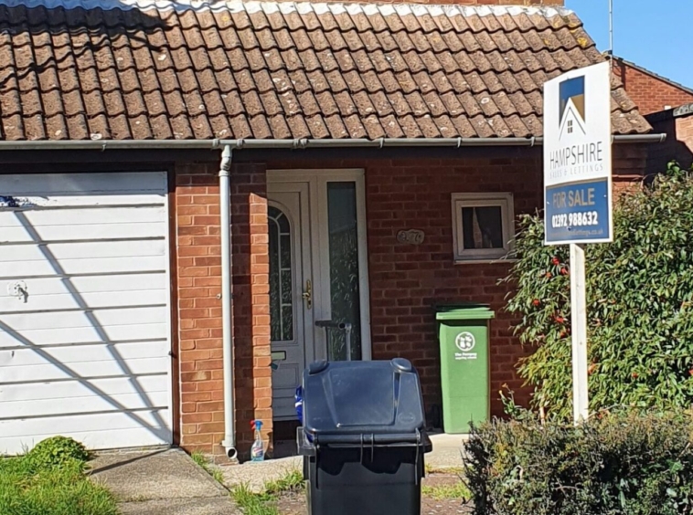 Front view of an end of terrace house