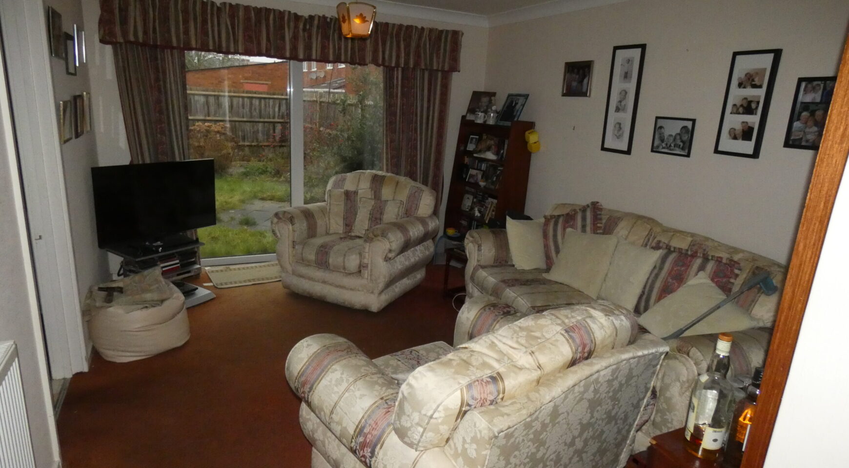 Lounge including furniture and television